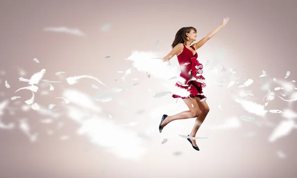 Jumping woman — Stock Photo, Image