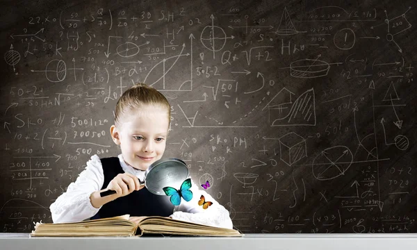 Girl in world of knowledge — Stock Photo, Image