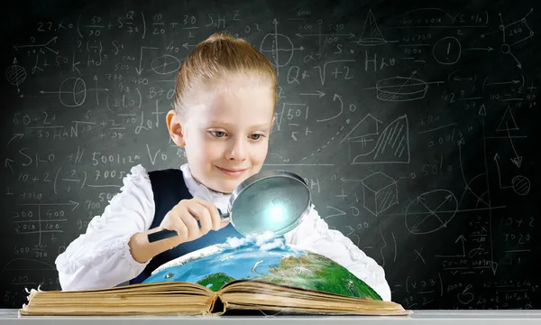 Girl in world of knowledge — Stock Photo, Image