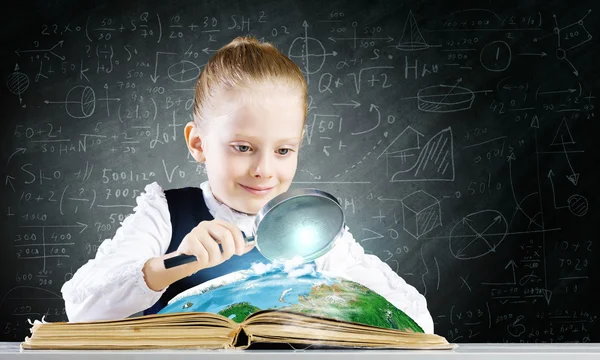 Girl in world of knowledge — Stock Photo, Image