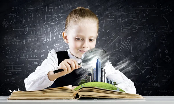 Girl in world of knowledge — Stock Photo, Image