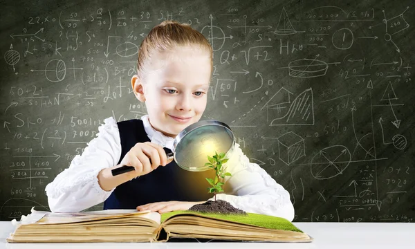 Girl in world of knowledge — Stock Photo, Image