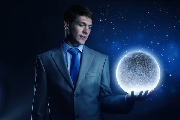 Man with moon — Stock Photo, Image