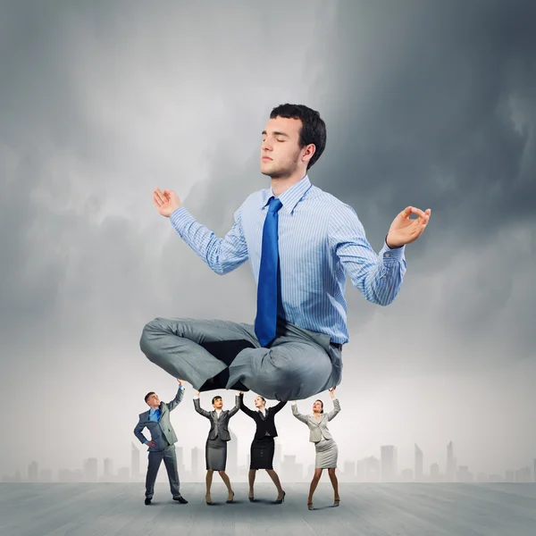 Meditating businessman — Stock Photo, Image