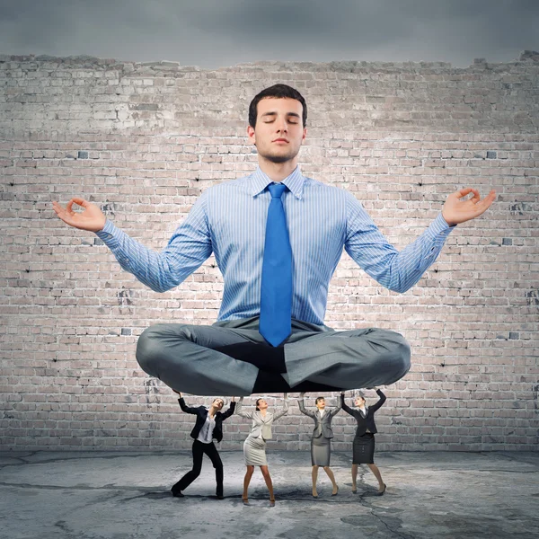Meditating businessman — Stock Photo, Image