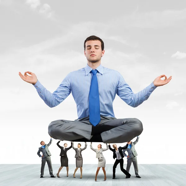 Meditating businessman — Stock Photo, Image