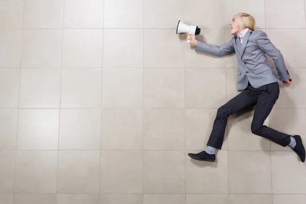 Homem de negócios com megafone — Fotografia de Stock