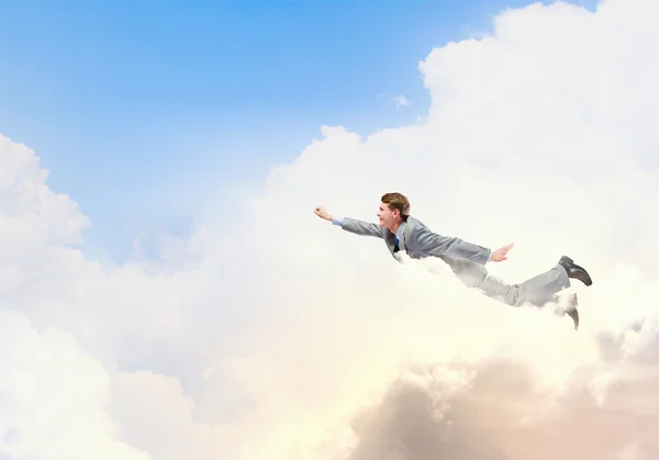 Flying businessman — Stock Photo, Image