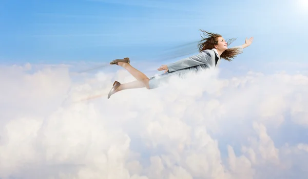 Flying businesswoman — Stock Photo, Image