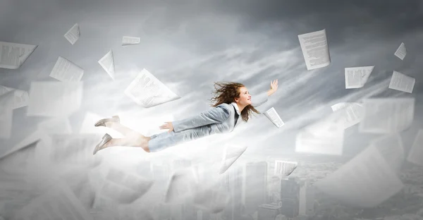 Flying businesswoman — Stock Photo, Image