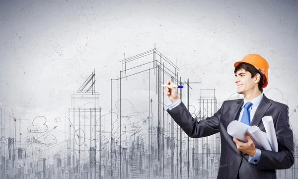 Engineer drawing sketches of construction project — Stock Photo, Image