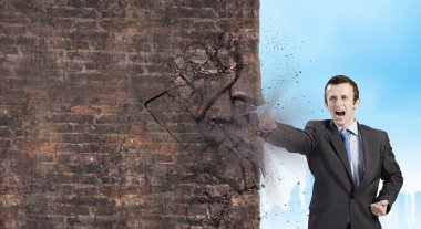 işadamı kırma taş duvar