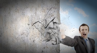 işadamı kırma taş duvar