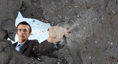 işadamı kırma taş duvar