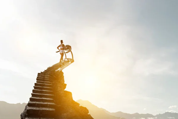 Woman running on a treadmill concept — Stock Photo, Image