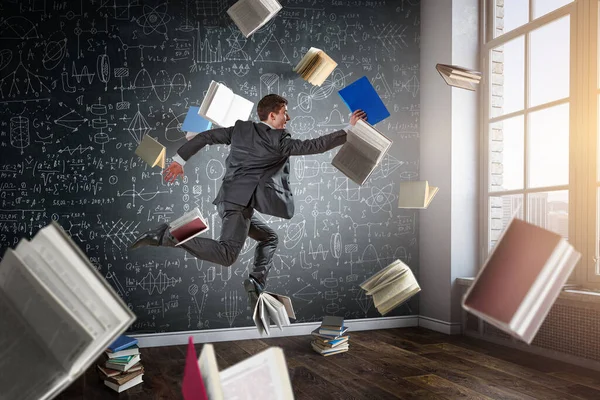 Gelukkige zakenman die hoog springt. Gemengde media — Stockfoto