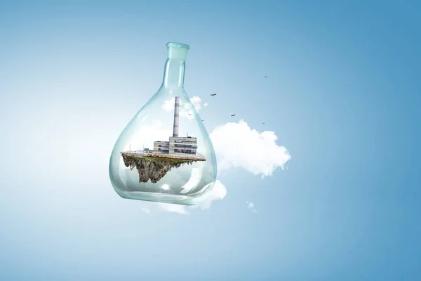 Промышленный пейзаж с дымоходами внутри стеклянной бутылки — стоковое фото