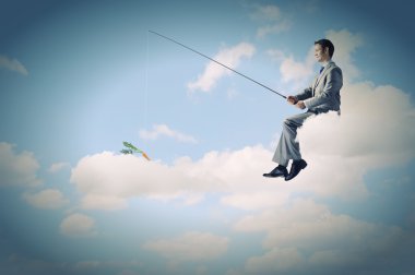 işadamı çubuk ile Balık tutma