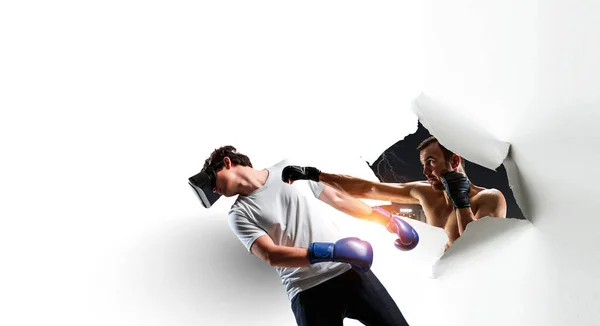 Young man boxing. . Mixed media — Stock Photo, Image