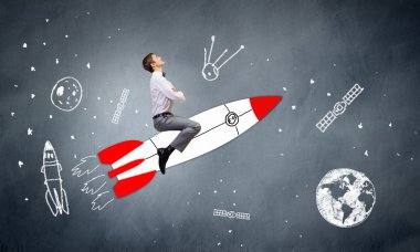 işadamı çizilmiş roket uçan