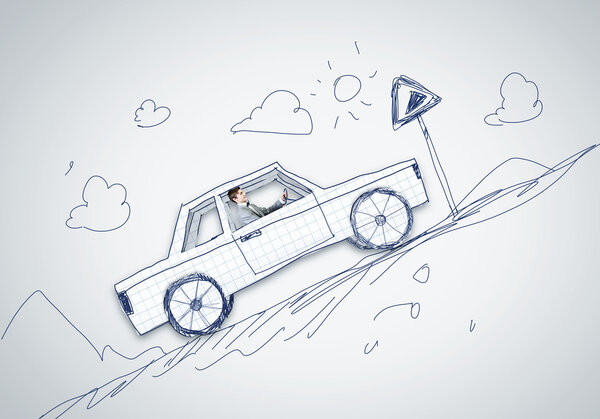 Человек за рулем автомобиля
