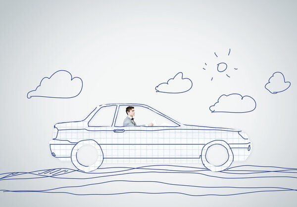 Человек за рулем автомобиля
