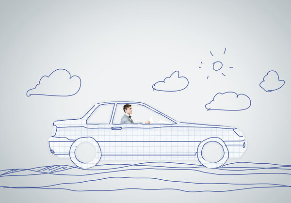 Человек за рулем автомобиля
