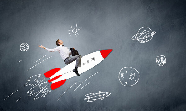 Businessman flying on drawn rocket