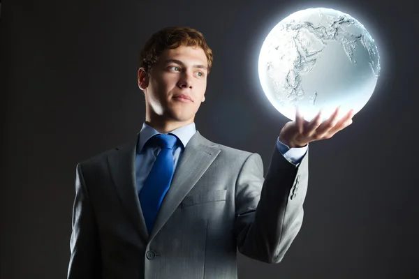 Podnikatel drží měsíc planety — Stock fotografie