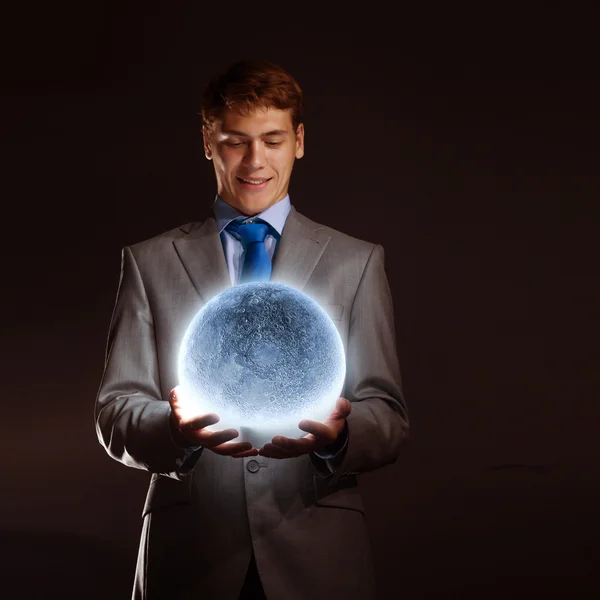 Empresário segurando planeta lua — Fotografia de Stock