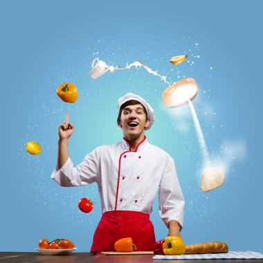 Aşçı ve malzemeler havada uçuşuyor.