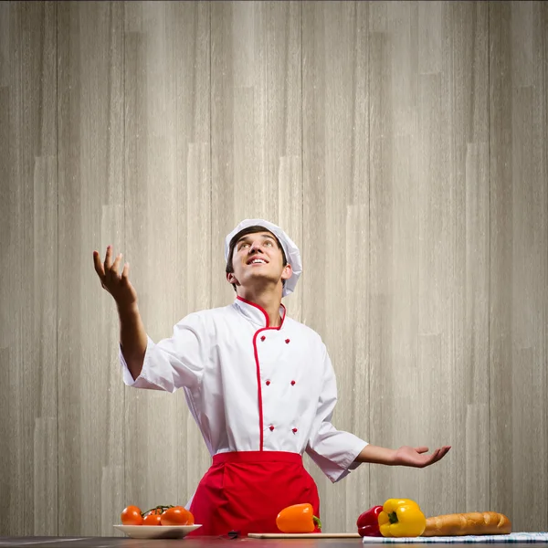 Cozinheiro e ingredientes — Fotografia de Stock