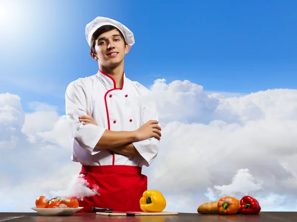 Jovem cozinheiro alegre — Fotografia de Stock