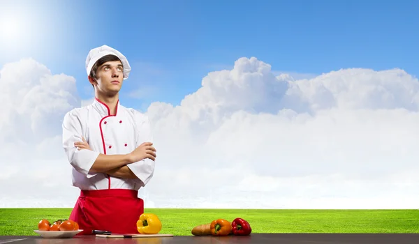 Jovem cozinheiro alegre — Fotografia de Stock