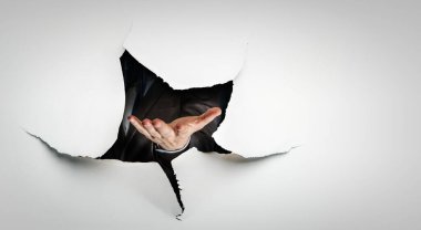 Kağıt delikte el resmi. Karışık ortam