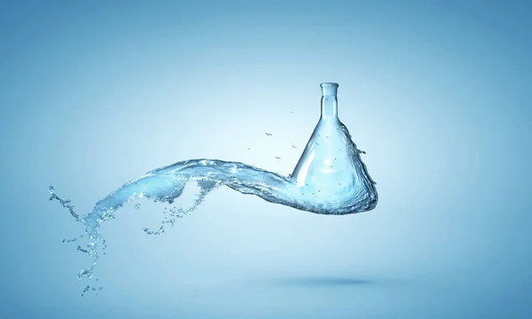 Water splash out of glass bottle — Stock Photo, Image