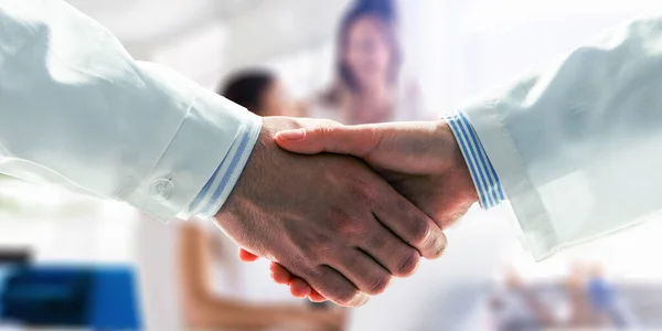 Partnership concept. Image of handshake . Mixed media — Stock Photo, Image