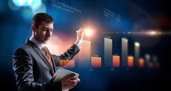 Business graph and trade monitor — Stock Photo, Image