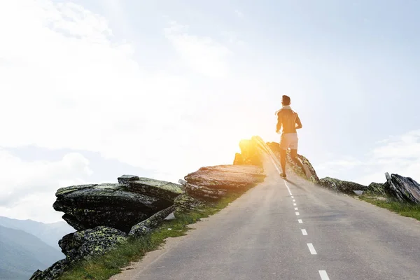 Man running on a treadmill concept — Stock Photo, Image