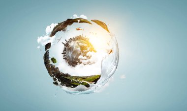 Çimen ve temiz suyla yeşil küre manzarası