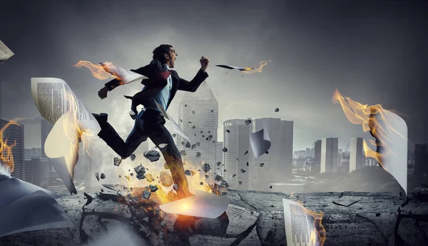 Portrait of energetic businessman running . Mixed media — Stock Photo, Image