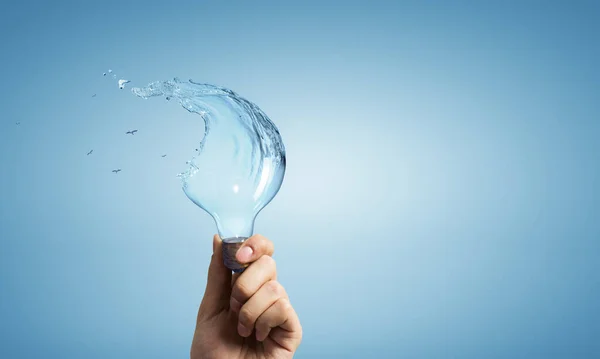 Light bulb from water splash — Stock Photo, Image