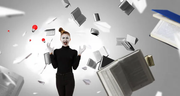 Female mime with book . Mixed media — Stock Photo, Image