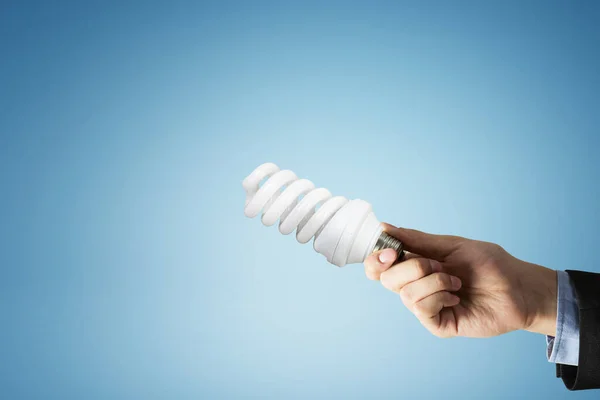 Lampadina con spruzzi di vetro bianco — Foto Stock