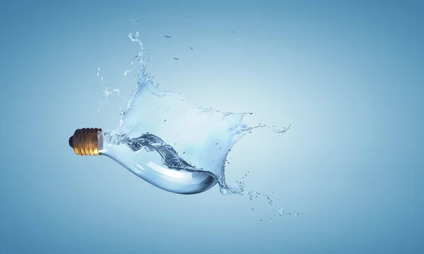 Light bulb from water splash — Stock Photo, Image