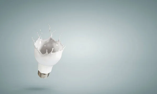 Lampadina con spruzzi di vetro bianco — Foto Stock