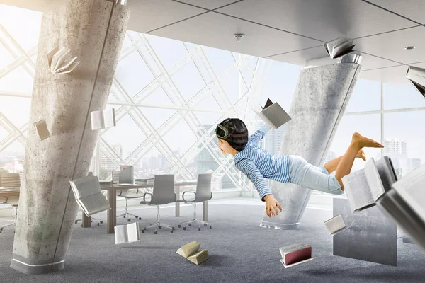World of books concept met vliegende jongen — Stockfoto