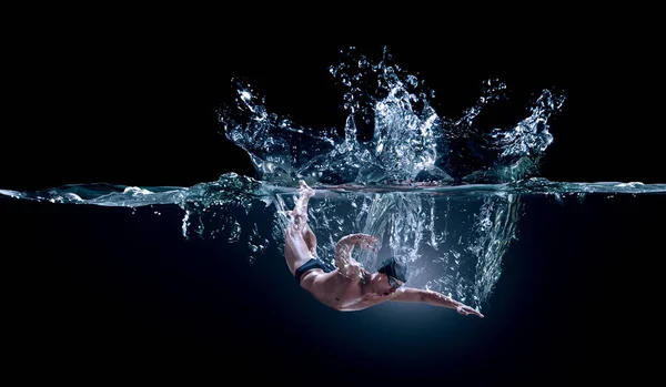 Professional man swimmer on a wave — Stock Photo, Image