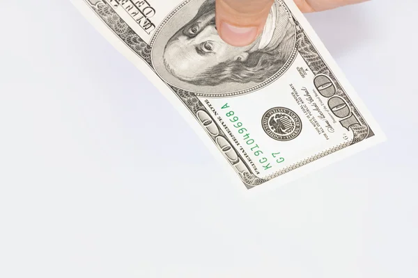 Hand met contant geld — Stockfoto
