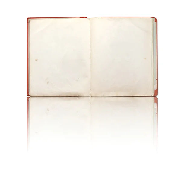Livro velho no assoalho reflexivo branco — Fotografia de Stock